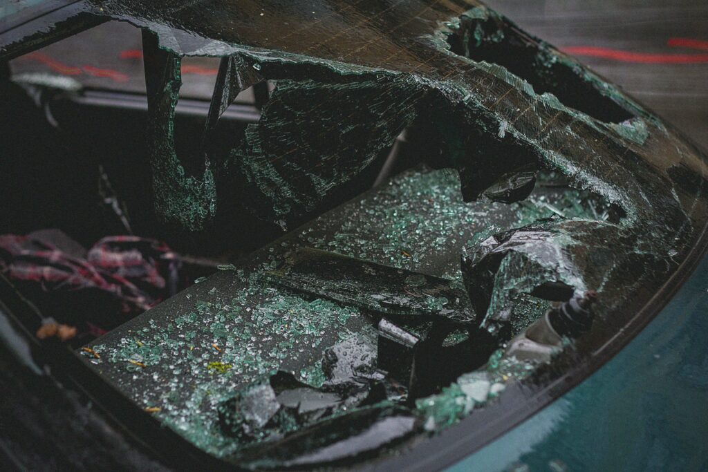 Photo by Artyom Kulakov: https://www.pexels.com/photo/a-broken-windshield-of-a-car-2265634/